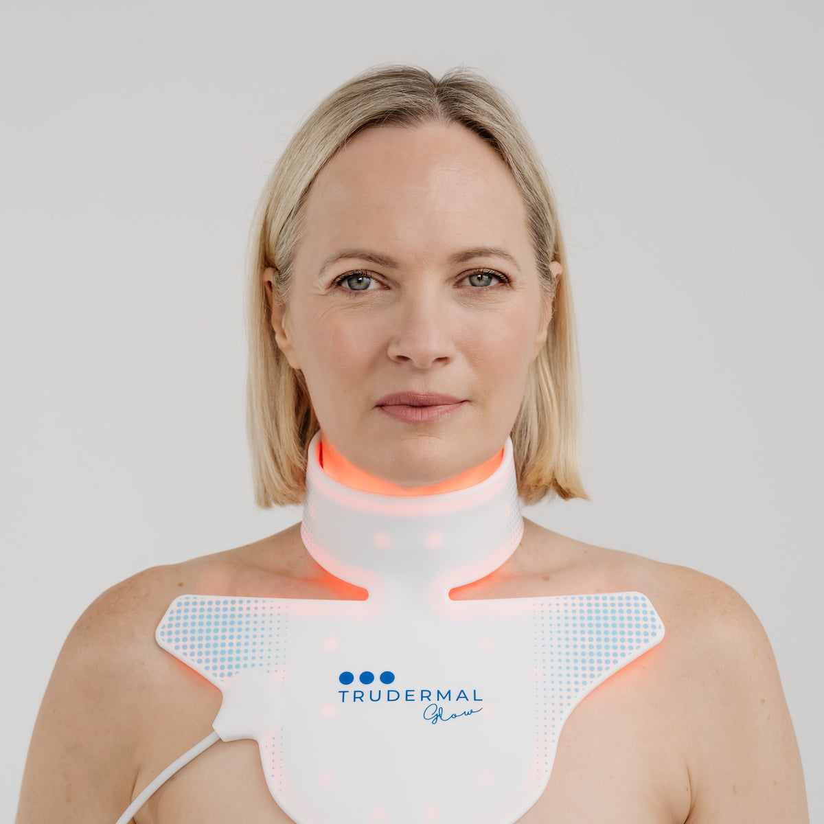 neck and chest led device being worn by model